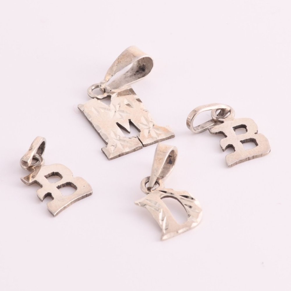 4 Sterling Silver pendants - (A214)